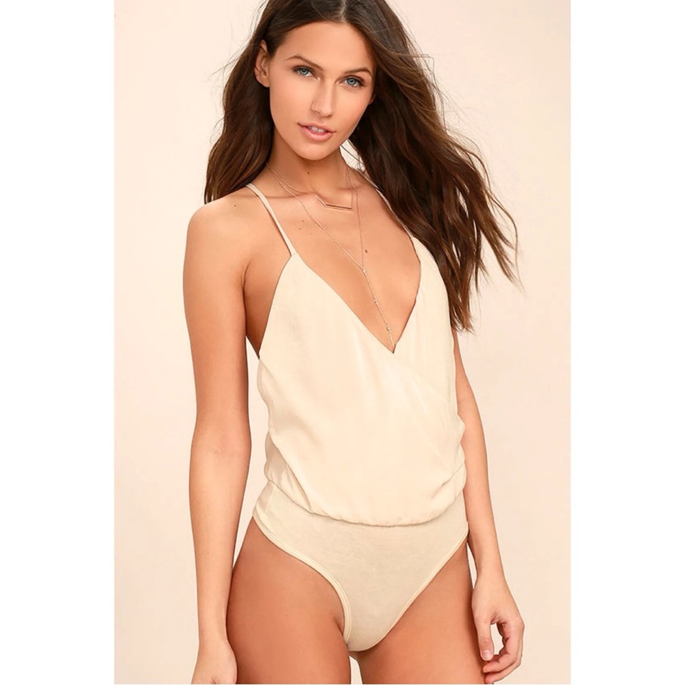 | new |  Lulus Cream Backless Bodysuit